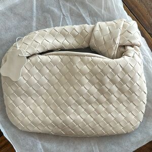 Small faux leather wrist/forearm bag